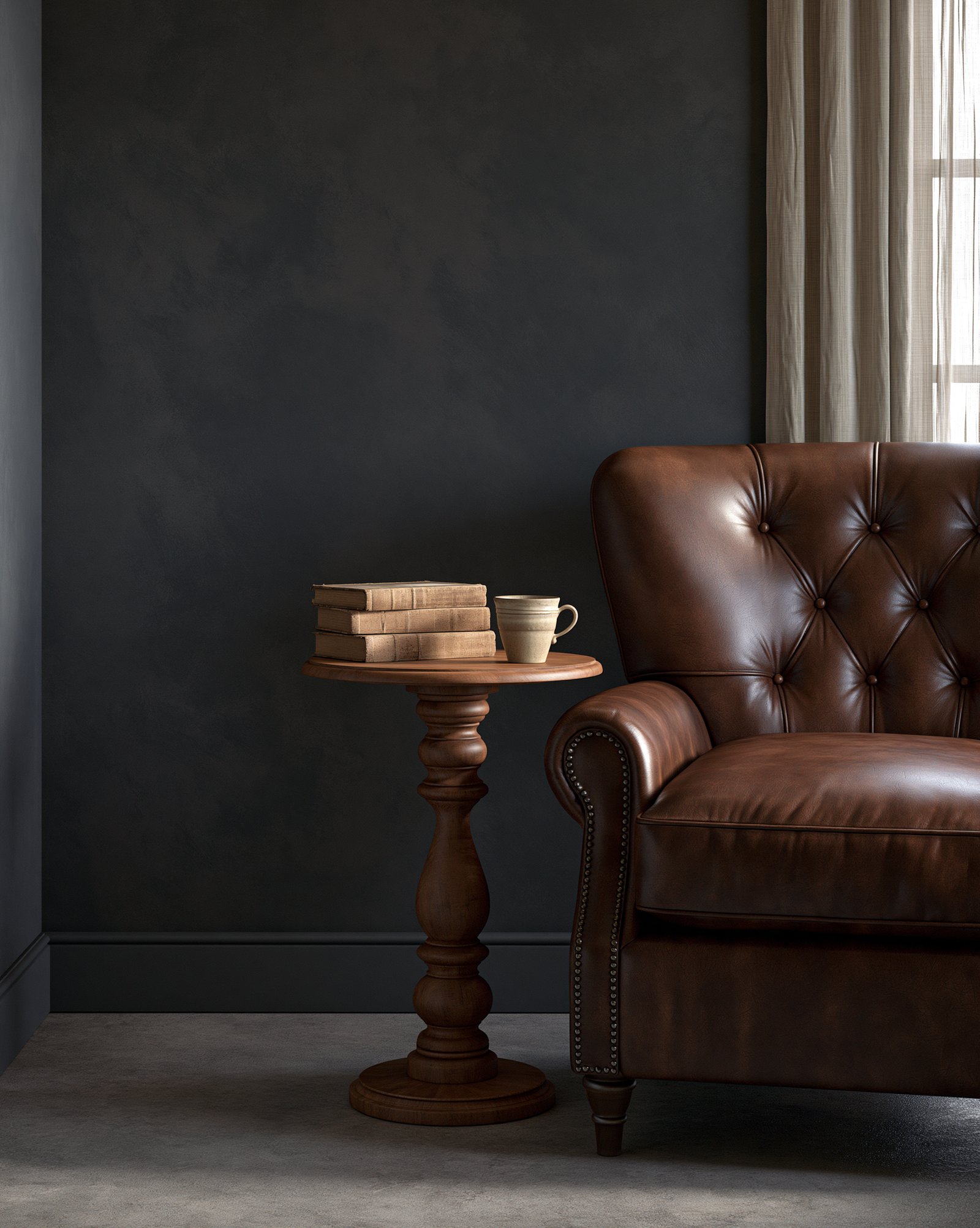 A small turned-spindle wood pedestal table beside a leather reading chair, holding a stack of books and a ceramic cup